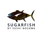 A stylized fish logo appears above the text. The words read: "SUGARFISH by SUSHI NOZAWA." The fish illustration features vibrant colors and intricate patterns.